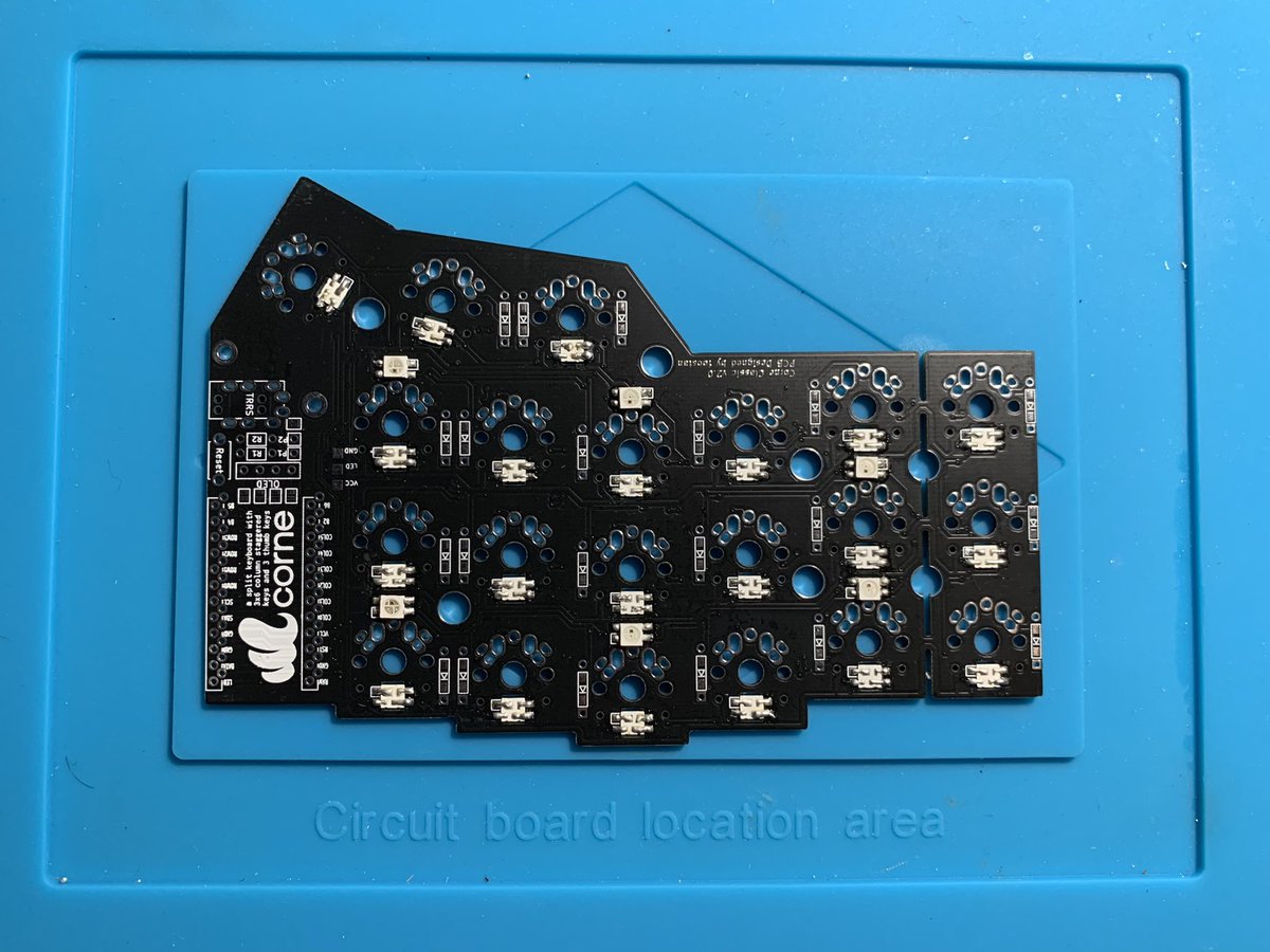 A PCB for half a keyboard, with SMD LEDs attached