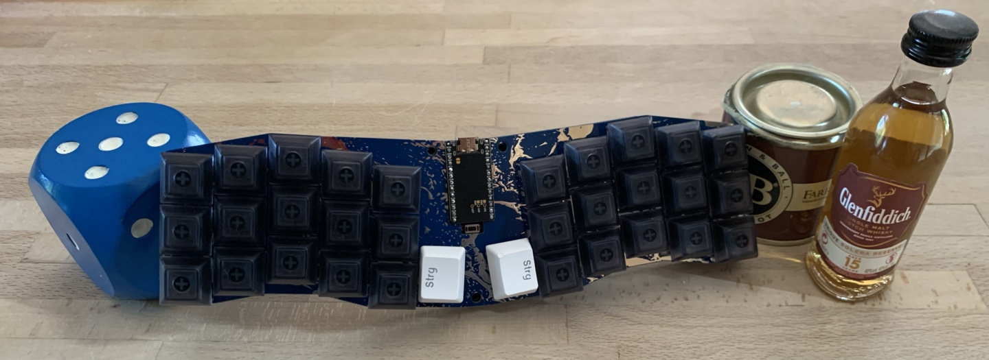 Manta keyboard with various unhelpful objects for scale