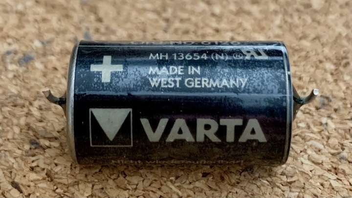 A black half-AA battery labelled "VARTA" and "Made in West Germany"